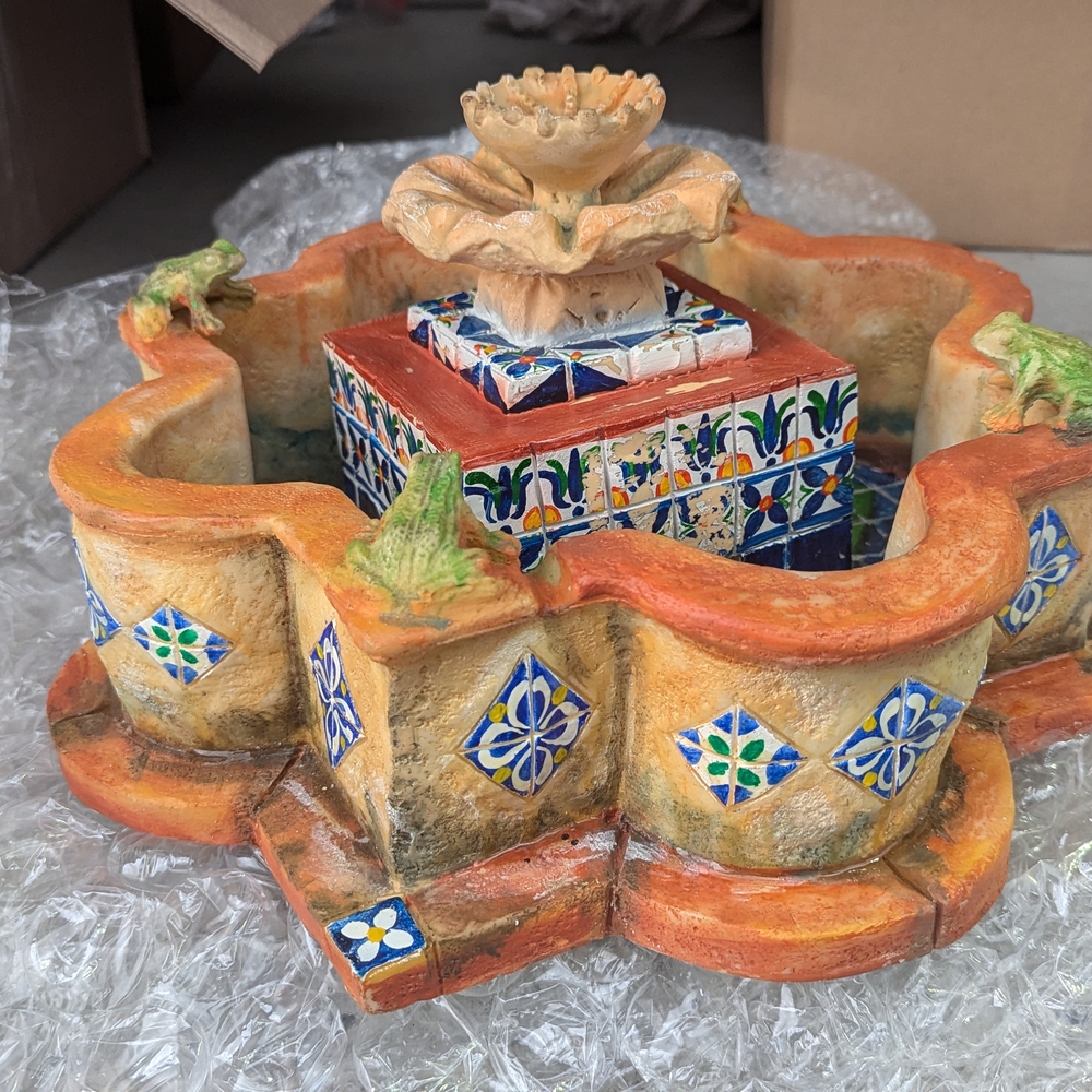 Colorful Ceramic Fountain with Tile Accents
